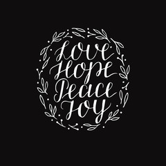 Hand lettering with inspirational holiday quotes Love, hope, peace, joy on black background.