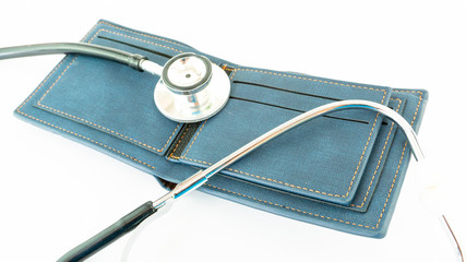 stethoscope check money on empty wallet bag