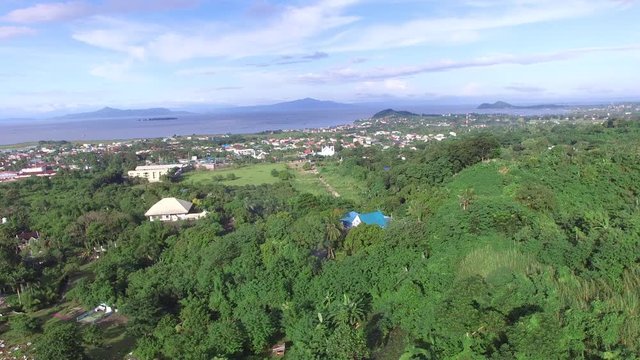 Los Ba&ntilde;os, Laguna, Philippines - November 21, 2017: Mountain rainforest modern housing built. Drone Aerial