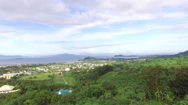 Los Ba&ntilde;os, Laguna, Philippines - November 21, 2017: Mountain rainforest modern housing built. Drone Aerial