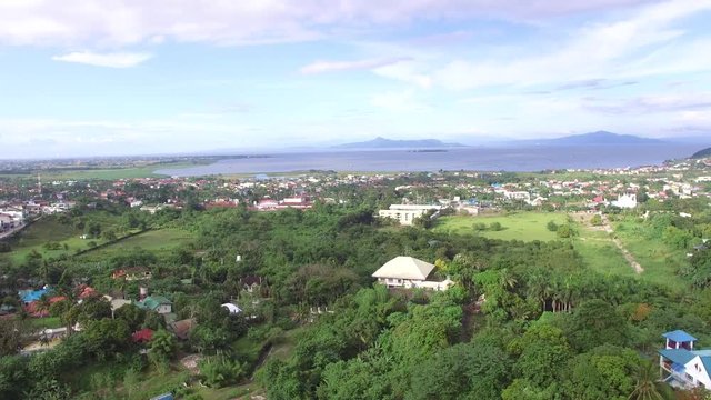 Los Ba&ntilde;os, Laguna, Philippines - November 21, 2017: Mountain rainforest modern housing built. Drone Aerial