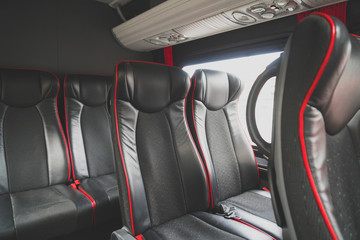 Seats in the cabin of a modern minibus.