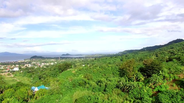 Los Ba&ntilde;os, Laguna, Philippines - November 21, 2017: Mountain rainforest modern housing built. Drone Aerial