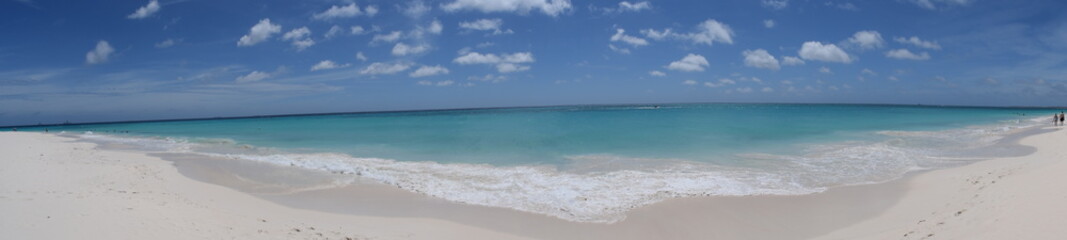 Panorama of Aruba beach and seaside, romantic view of an idyllic Caribbean island perfect for honeymoon and romantic holidays