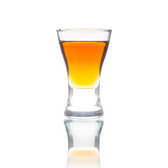 Cocktail Glass with brandy or whiskey - Small Shot. Isolated on white background