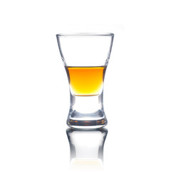 Cocktail Glass with brandy or whiskey - Small Shot. Isolated on white background
