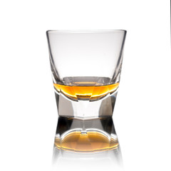 Cocktail Glass with brandy or whiskey - Small Shot. Isolated on white background