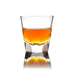 Cocktail Glass with brandy or whiskey - Small Shot. Isolated on white background