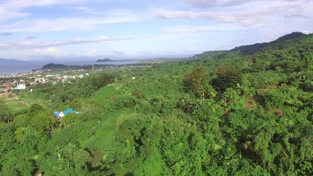 Los Ba&ntilde;os, Laguna, Philippines - November 21, 2017: Mountain rainforest modern housing built. Drone Aerial