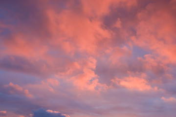 Beautiful vanilla sky, purple pink tone, when sunrise over the sea.