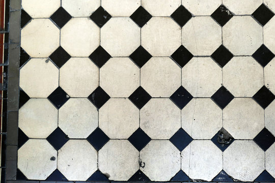 antique tiles on a floor. background texture.