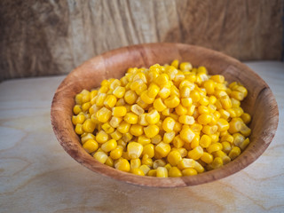 Canned corn in a bamboo cup Close-up.