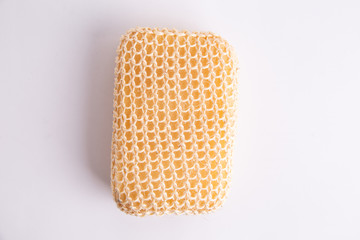 sponge with esparto to exfoliate in bathroom