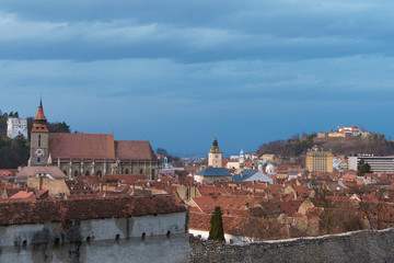 Fototapeta premium Iconic view of Brasov with 3 of the most important towers: Black Church, Council Square and the fortress of Brasov