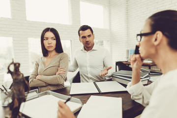 Young Couple Came To Lawyer. Divorce Concept.