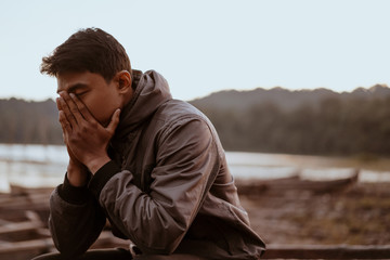 asian young man enjoying the cold morning