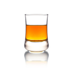 Cocktail Glass with brandy or whiskey - Small Shot. Isolated on white background