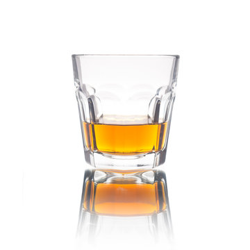 Cocktail Glass with brandy or whiskey - Small Shot. Isolated on white background