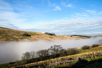 Autumnal mist in a valley