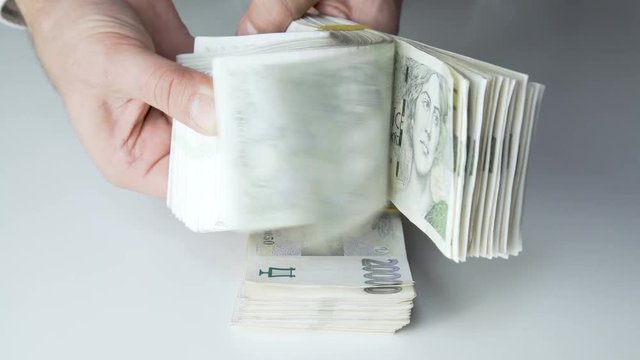 spreads the money like a fan Czech Koruna CZK Kc, in nominal  2000 Banknotes  zechia, Czech Republic