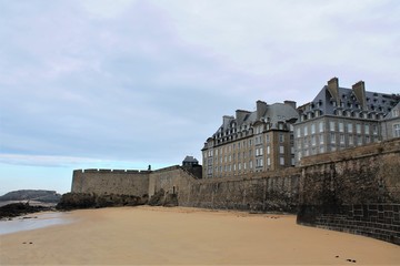 Fototapeta na wymiar Ramparts of Saint Malo city on a cloudy day, Brittany, France