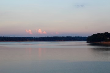 Fototapeta na wymiar The orange sky of the setting sun at the lake in Tennessee.