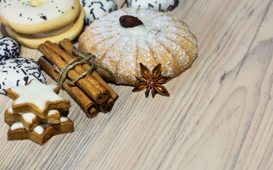Fototapeta premium Christmas cookies with cinnamon sticks nuts and star anise