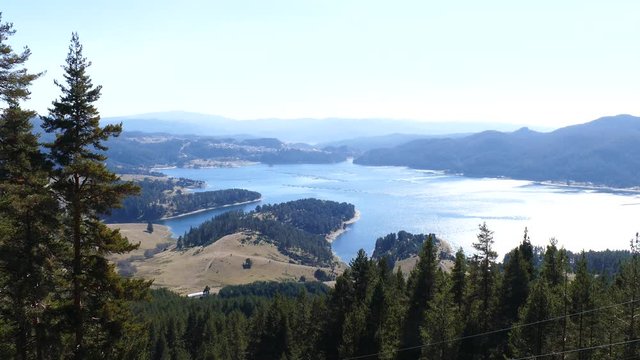 Mountain landscape with a lake. Dospat Dam, Rodopi Mountain, Bulgaria.