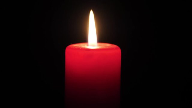 Burning candle close up shot