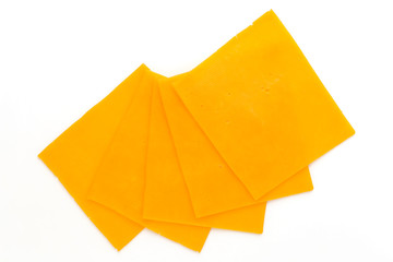Cheddar cheese slice isolated on the white background.