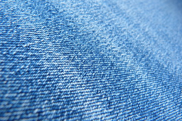 Fototapeta na wymiar jeans closeup blue fabric cotton polono natural materials background
