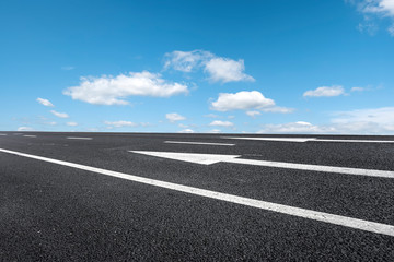 Empty highway asphalt pavement and sky cloud landscape..