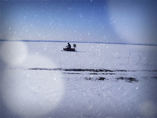 Naklejka premium Rading on snowmobile. Ukranian winter