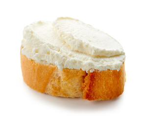 Fresh cream cheese on bread isolated on white background
