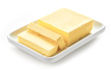 Sliced butter isolated on white background