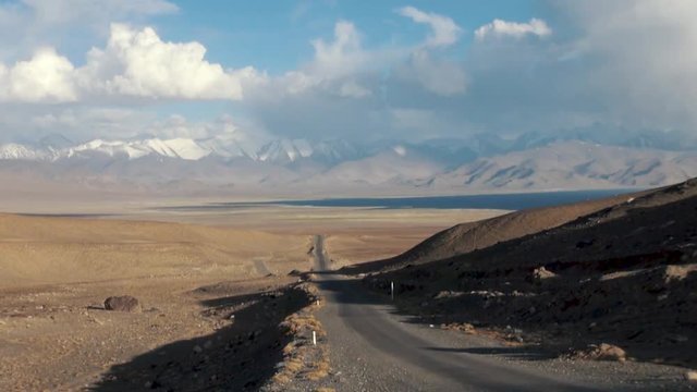 Karakul Lake Tajikistan. M41 Pamir Highway, Khorog, Tajikistan. Karakul Lake Is a Large Lake High in the Pamir Mountains (Altitude 3914 M). Located in the Tajik National Park in the Pamir Mountains