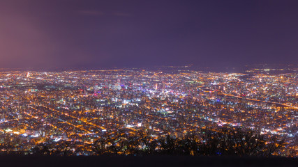 Fototapeta na wymiar panorama of cityscape in the night view from Moiwa mountain, Sapporo in Kokkaido, Japan
