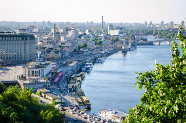 Panorama of city landscape, historical district with river embankment of city Kiev.