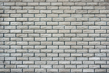 Wall of decorative natural brickwork.
