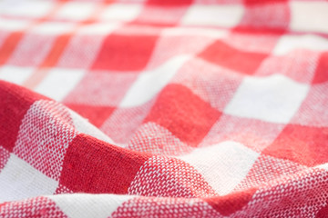 red and white checkered creased  kitchen towel background