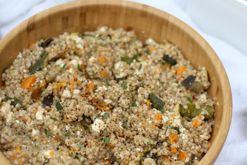 Buckwheat, sweet potato, zucchini and feta cheese salad. Close-up, selective focus.