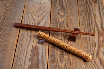 Two chopsticks on boards