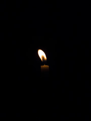 A Candle flame in the dark 