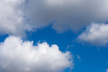 white clouds on blue sky