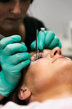 Spa: Aesthetician Applies Eyelash Extensions To Patient