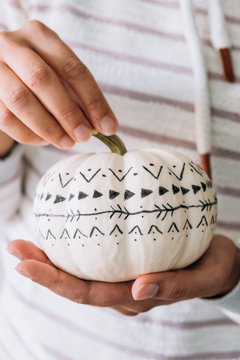 White pumpkin with geometric pattern design