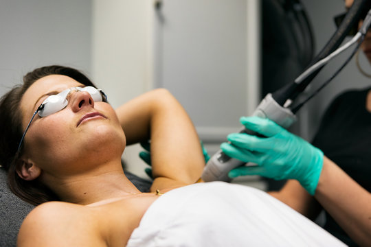 Spa: Female Patient Undergoing Laser Hair Removal Treatment