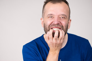 Man biting his nails