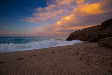 beach with rocks and sky