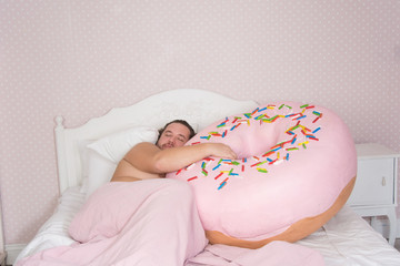 Funny man and donut. Diet. 
